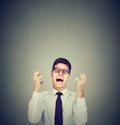 Stressed young business man in glasses screaming in desperation Royalty Free Stock Photo