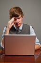 Stressed Young Business Man on Laptop Royalty Free Stock Photo