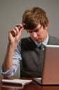 Stressed Young Business Man on Laptop Royalty Free Stock Photo