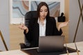 Stressed young business woman annoyed with computer problem, office worker hates stuck laptop Royalty Free Stock Photo