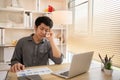 Stressed Young Businessman Facing Financial Loss in Corporate Office Royalty Free Stock Photo