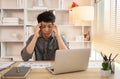 Stressed Young Businessman Facing Financial Loss in Corporate Office Royalty Free Stock Photo