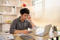 Stressed Young Businessman Facing Financial Loss in Corporate Office Royalty Free Stock Photo