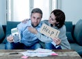 Young Couple Feeling sad and stressed paying bills debts mortgage having financial problems Royalty Free Stock Photo