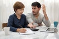 Young couple planning their montly expense. Royalty Free Stock Photo