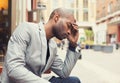 Stressed young man hands on head with bad headache Royalty Free Stock Photo