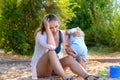 Stressed young mother with a difficult baby boy Royalty Free Stock Photo