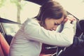 Stressed young woman driver sitting inside her car Royalty Free Stock Photo