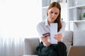 Stressed young woman has financial problems credit card debt to pay utmost Royalty Free Stock Photo