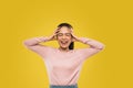 stressed young woman shouting with two hands holding head Royalty Free Stock Photo