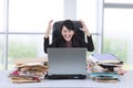 Stressful businesswoman screaming in office 1 Royalty Free Stock Photo