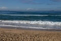 Stretch of Beach with Ships Anchored on Horizon