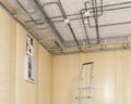 Stretch ceilings profile frames with electrical wiring on ceiling,