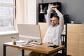 Stretch Exercise At Office Desk. Businessman Royalty Free Stock Photo