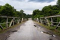 A stretch of the original route 66 wih an old steel bridge in the State of Missouri