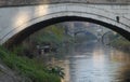 Stretch of river between the two bridges and with three boats in Padua in Veneto (Italy