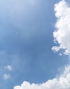 a stretch of white clouds with a blue sky during the day forms a unique and interesting horizon Royalty Free Stock Photo