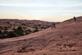 Stretch your cycling trails beyond ordinary and obvious trails. Full length shot of two men out mountain biking together