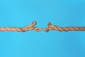 Stretched frayed rope breaking Royalty Free Stock Photo