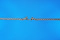 Stretched frayed rope breaking Royalty Free Stock Photo