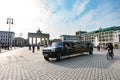 Stretched limousine in front of Brandenburg Gate, Berlin