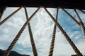 Stretched ropes on background blue sky and clouds Royalty Free Stock Photo
