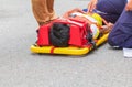 Stretcher yellow and patient injured for emergency paramedic service Injury with medical equipment in emergency rescue situation