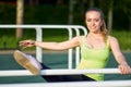 Stretching danser or gymnast woman training in workout sports ground Royalty Free Stock Photo