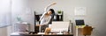 Stretching Exercise At Desk. African American Woman Royalty Free Stock Photo