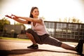 Stretching first. Young woman exercise.