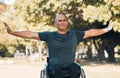 Stretching, fitness and wheelchair user in park for workout, health and muscle relief. Man with a disability, training Royalty Free Stock Photo