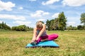 Stretching and flexing for young woman exercising suppleness Royalty Free Stock Photo