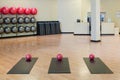 Stretching mats and exercise balls in gym