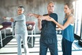 Stretching, physical therapy and old man with personal trainer for fitness, wellness or helping. Health, workout or Royalty Free Stock Photo