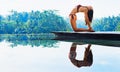 Young yoga woman stretching back in ustrasana camel pose