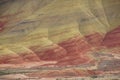 Striated red and brown paleosols in the Painted Hills Royalty Free Stock Photo