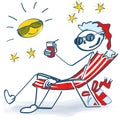 Stick figure as a santa in the deck chair Royalty Free Stock Photo