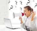 Strict businesswoman shouting in megaphone Royalty Free Stock Photo