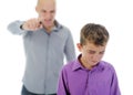 Strict father punishes his son Royalty Free Stock Photo