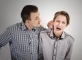 Strict father punishes his son. Royalty Free Stock Photo