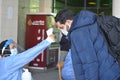 Strict precautionary measures before a building entry, face masks, hand gels, checking vaccine status during omicron outbreak