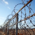 Strict security zone Fence adorned with forbidding barbed wire deterrents