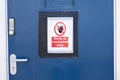 Strictly no unauthorised access sign at construction site security door