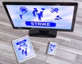 Strike concept on different devices Royalty Free Stock Photo
