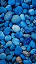 A striking assemblage of rugged, irregularly shaped blue minerals and stones, their varied hues and textures creating a