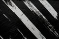 Striking black and white brushstroke textures on canvas, ideal for bold graphic visuals, artistic web design, or