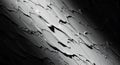 Close up macro photograph of a textured surface with dramatic lighting and deep shadows Royalty Free Stock Photo