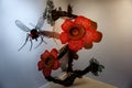 Botanical Art Installation Featuring Red Spotted Rafflesia and Giant Fly Model Royalty Free Stock Photo