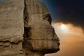 A striking close-up of the great sphinx of Giza (Cairo, Egypt) shrouded in the sunset of the desert Royalty Free Stock Photo