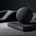 Textured Black Sphere and Block on Dark Background Royalty Free Stock Photo